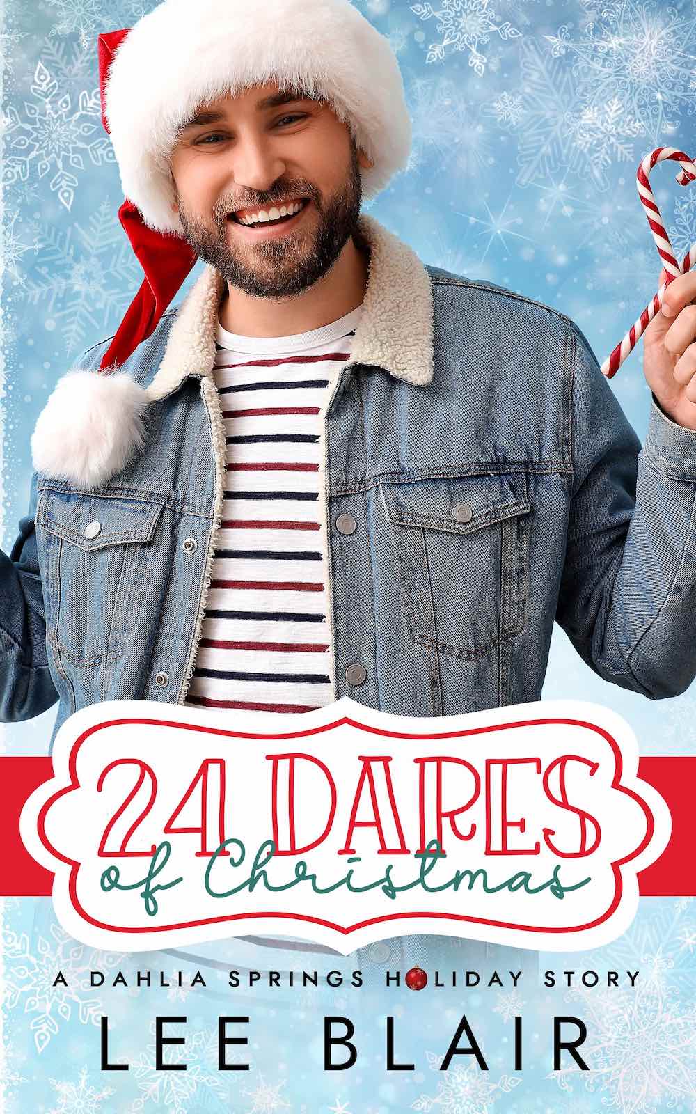 24 Dares of Christmas by Lee Blair. A smiling Caucasian man has a brown beard and is wearing a Santa hat. He's holding two candy canes making the shape of a heart.
